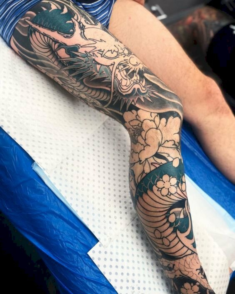 Hình xăm rồng full chân đẹp