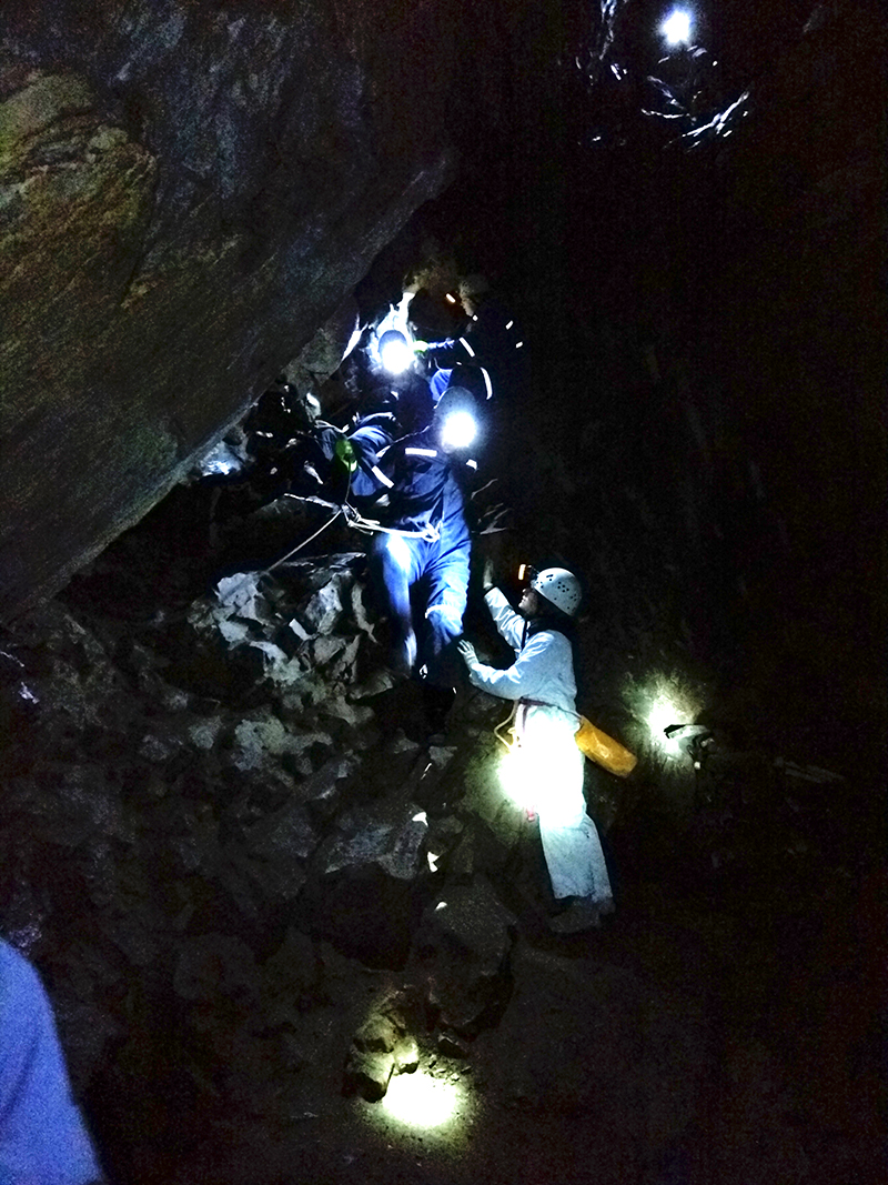 Participants descend further into Rat’s Nest Cave in Grotto Mountain, near Canmore, Alta., on May 9, 2015. (Steve Silva)