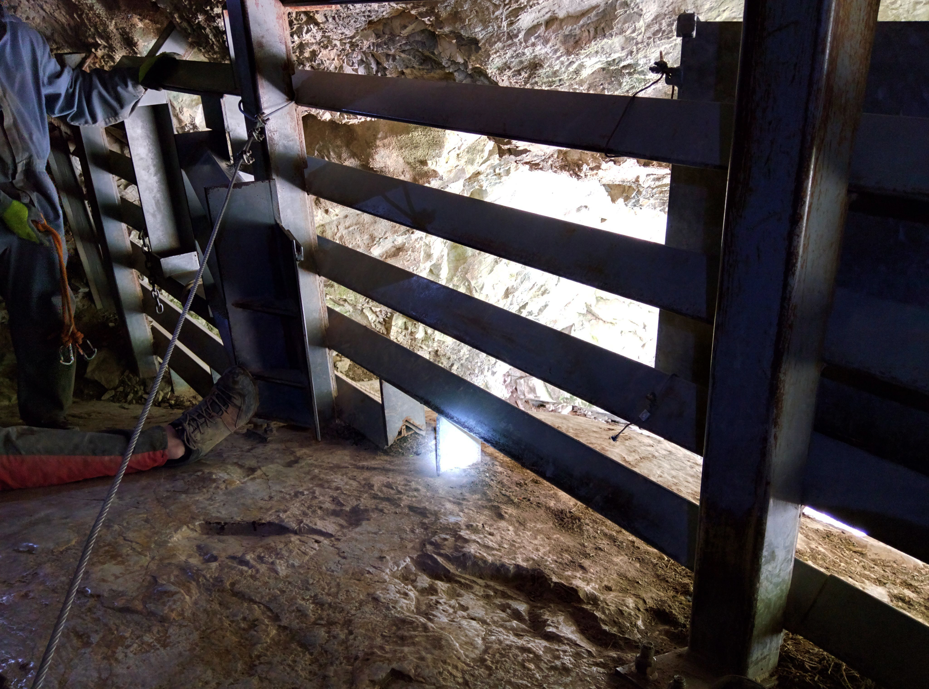 The gates at the main entrance to Rat’s Nest Cave in Grotto Mountain, near Canmore, Alta., pictured on May 9, 2015. (Steve Silva)